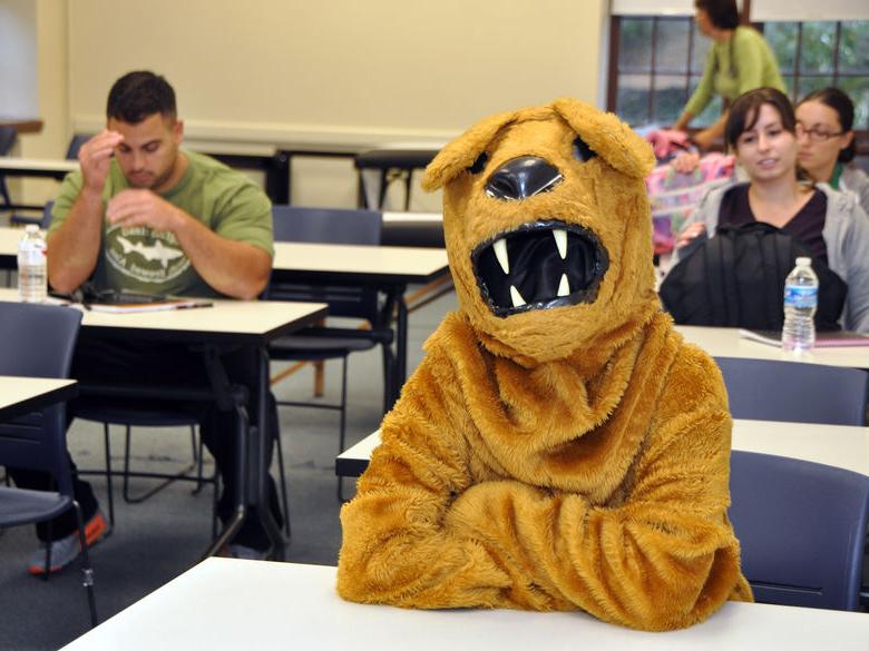 Nittany lion sitting in classroom 